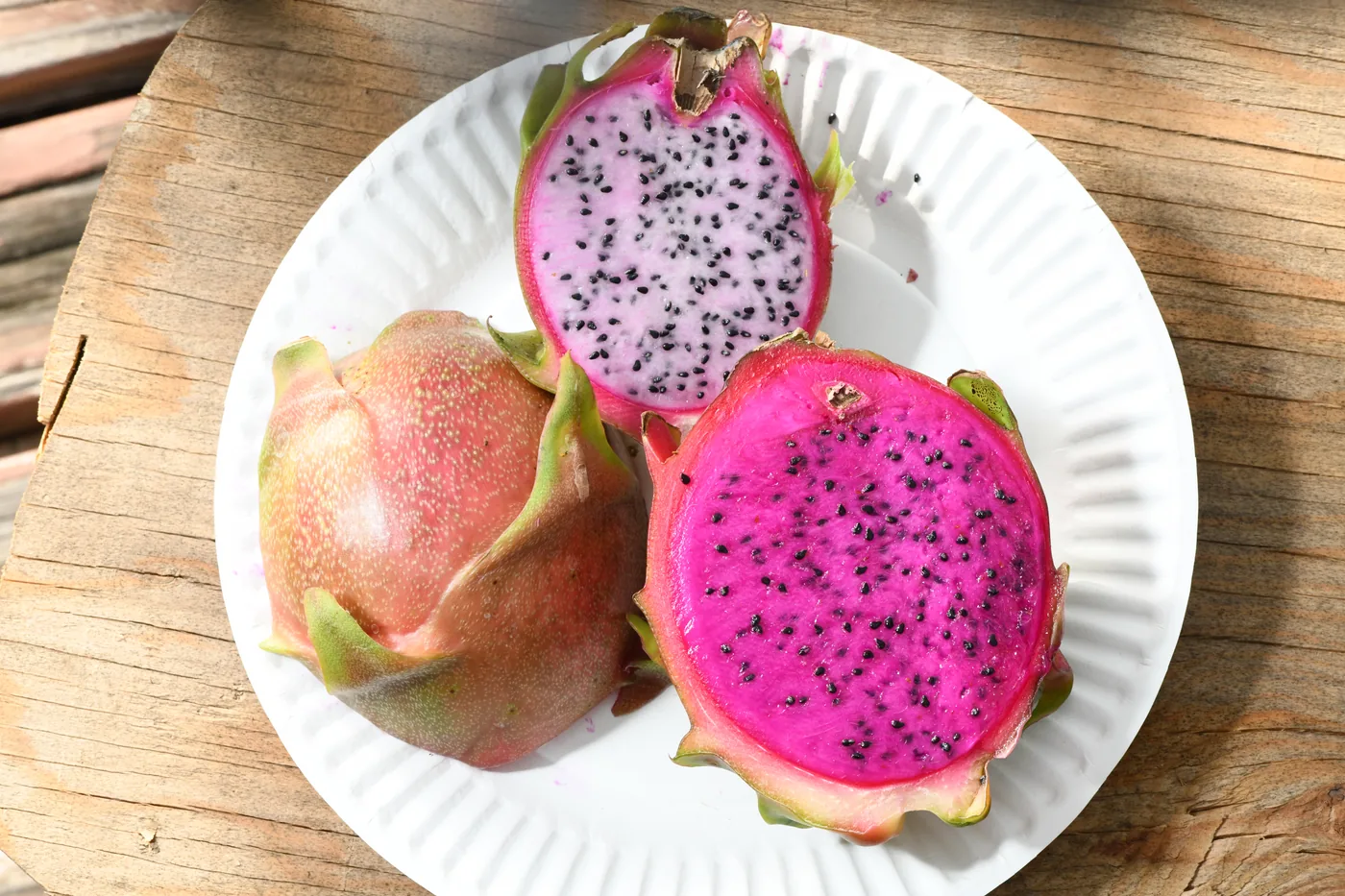 Dragon fruit halves on a plate
